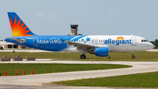 Airbus A320 (N218NV) - Allegiant's Make A Wish Livery taxi's past on it's way for departure.