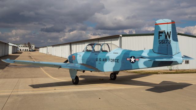 Beechcraft Mentor (N34DY) - A former USAF (55-173) A45/T-34 sits outside the hangar at Warren County Airport.