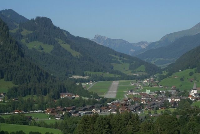 — — - Saanen airport, Switzerland. Typical Swiss alpine airport. 