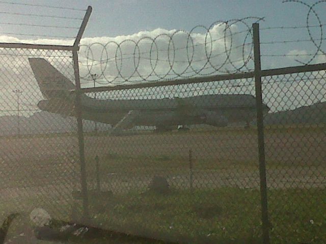 — — - A bird in a cage The aircraft a 747 bearing the marks of Kingdom Holdings a company owned by HRH Prine Alwaleed of Saudi Arabia sits after a few days under the tropical sun.  Another aircraft not pictured belonging to the same company, an Airbus, as well accompanies the Prince