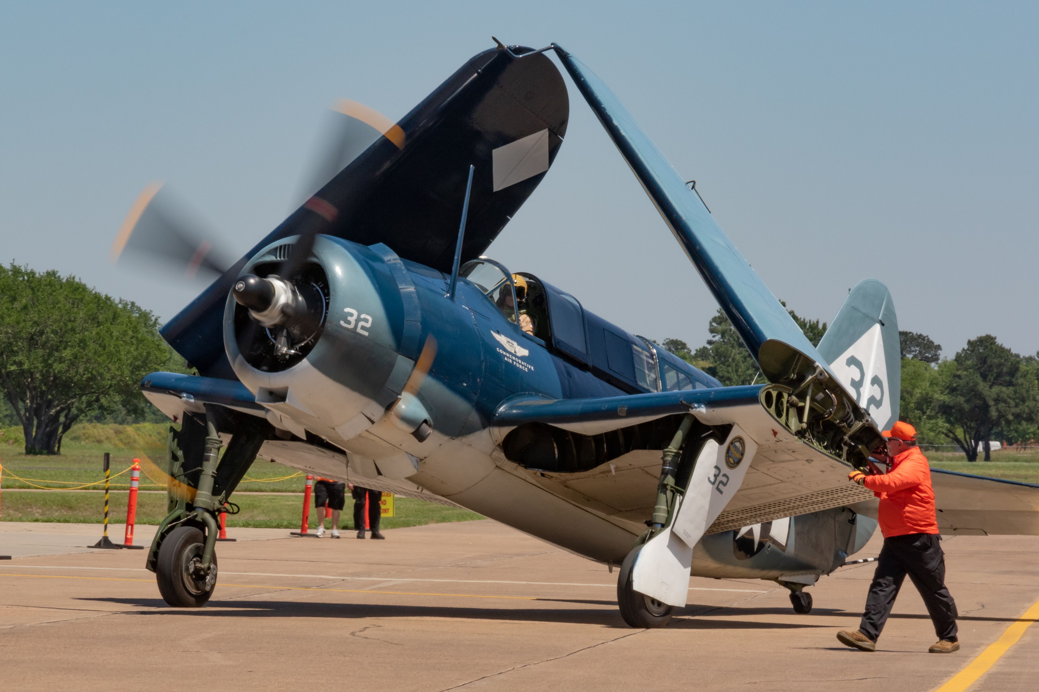 Experimental  (N92879) - SB2C-5 Helldiver aircraft with wings folded taxies after landing at Houston Executive Airport in April 2019. This is the only flying example of this aircraft type in the world.