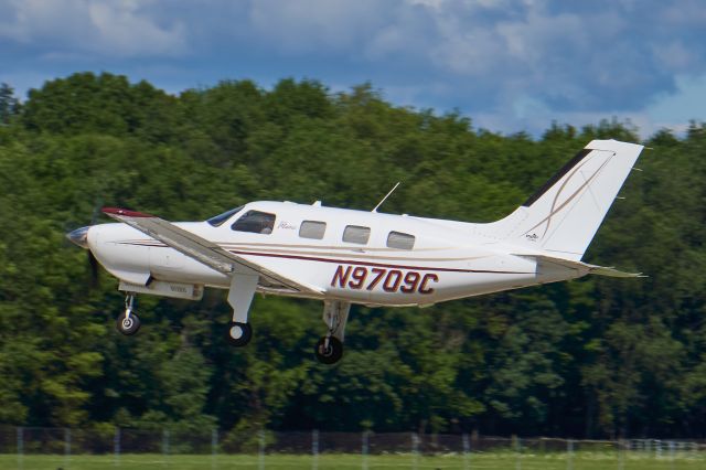 Piper Malibu Mirage (N9709C) - Departing Runway 26