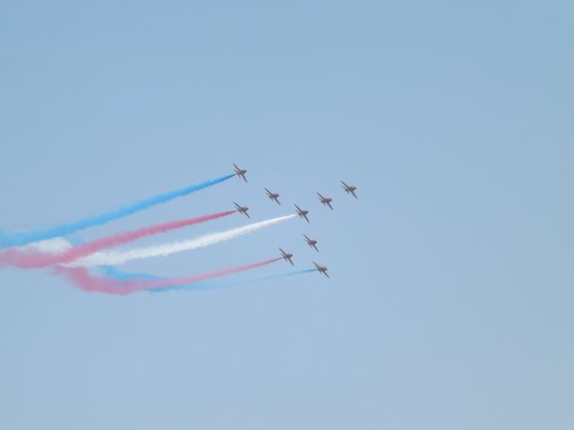 — — - red arrows forming concord at RAF waddington airshow