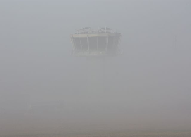 — — - Cork ATC tower covered in fog