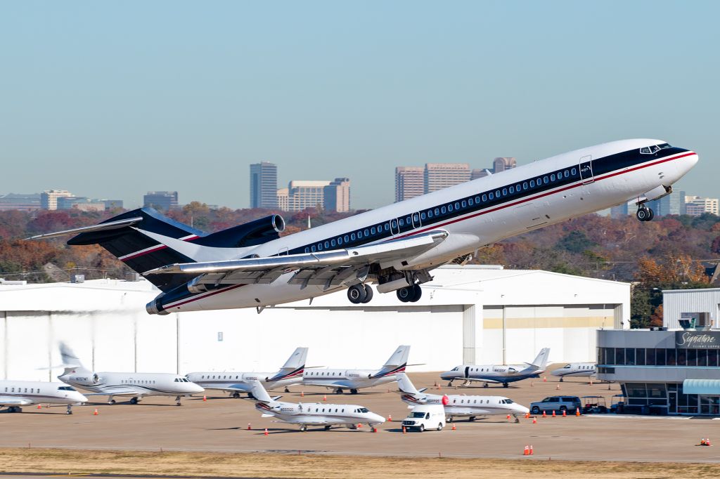 BOEING 727-200 (N438BN) - A wonderful surprise to see this classic 45 year old 727-200 depart Dallas Love Field this morning. br /This particular 727 has a storied career, starting off with Braniff International Airways in May of 1975. It then changed hands to People Express and was even flown by Southwest Airlines for a short time! It ended up eventually being most well known as the team transport for the MLB's Colorado Rockies before being placed into storage in 2016. br /In September 2019, the aircraft changed ownership to "CARIBBEAN CARGO CARRIERS LLC, and interestingly, the registration was reverted from N17773 back to its former Braniff registration, N438BN. The aircraft was then flown out of the Marana, AZ boneyard to Kansas City. After multiple attempts to fly the 727 to Dallas Love Field, the aircraft finally touched down on December 5th. After 5 days, the aircraft departed for Miami. br /It's unknown what will become of this aircraft but clearly there is something in the works. Either way, it's fantastic to see another one of these beautiful tri-holers snatched from the grave. A boneyard story with a happy ending!