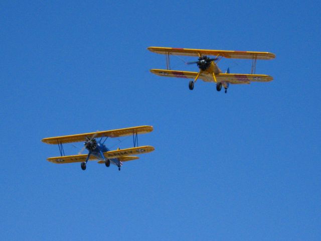 — — - MAKING LOW PASS OVER RWY 24