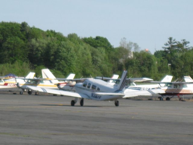 Piper Saratoga (N32RF) - Taxiing back to runway 32 for a takeoff on this beautiful spring afternoon.