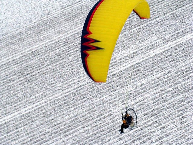 Saab 340 (NXXX) - Scott Clark powered paragliding over the Illinois corn fields. just a young kid with a dream.