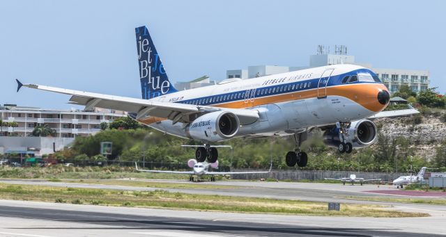 Airbus A320 (N763JB) - JetBlue Retro landing at St Maarten.