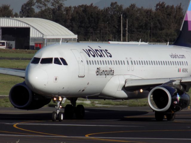 Airbus A319 (N509VL) - Took me by surprise, at first, to see an airplane with my Mums name on it... !