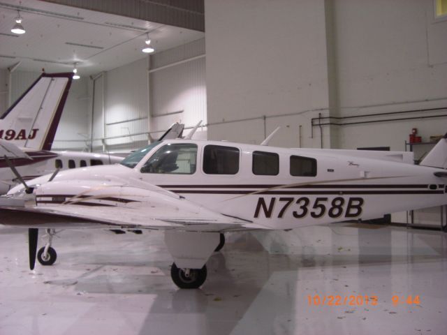 Beechcraft Baron (58) (N7358B) - Hangared at KFYV