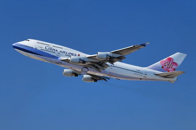 Boeing 747-200 (B-18207) - A China Airlines operated Boeing 747-400 series jumbo jet takes to the skies after lift off from the Los Angeles International Airport, LAX, in Westchester, Los Angeles, California