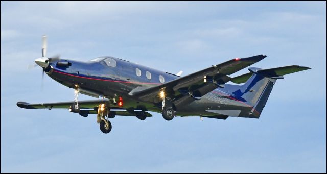Pilatus PC-12 (N927JC) - Wingspan 20 departing  runway one-two at KMCE