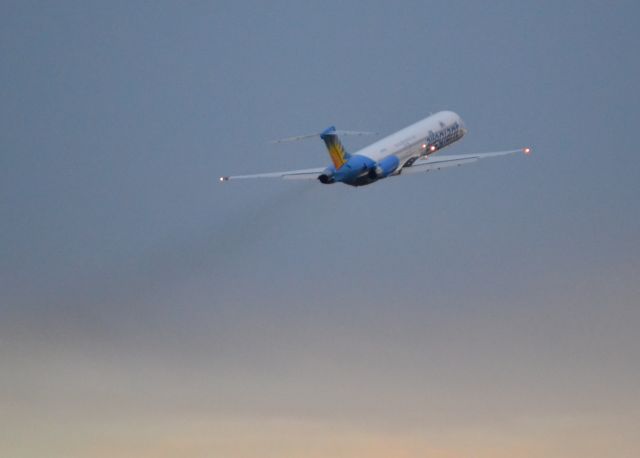 McDonnell Douglas MD-83 (N869GA) - Departing runway 20 at dusk - 3/14/16