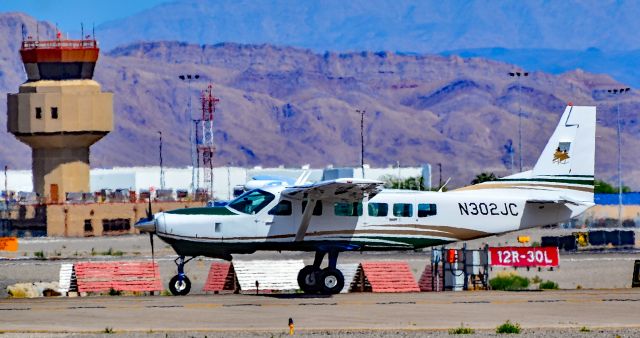 Cessna Caravan (N302JC) - N302JC Cessna 208 s/n 20800535 - North Las Vegas Airport  KVGTbr /Photo: TDelCorobr /May 14, 2024