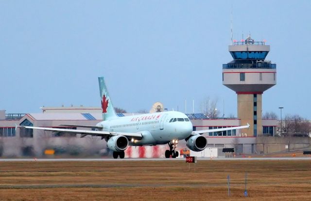 Airbus A319 (C-GBIK) - Departing for Toronto Airport from rwy 7.