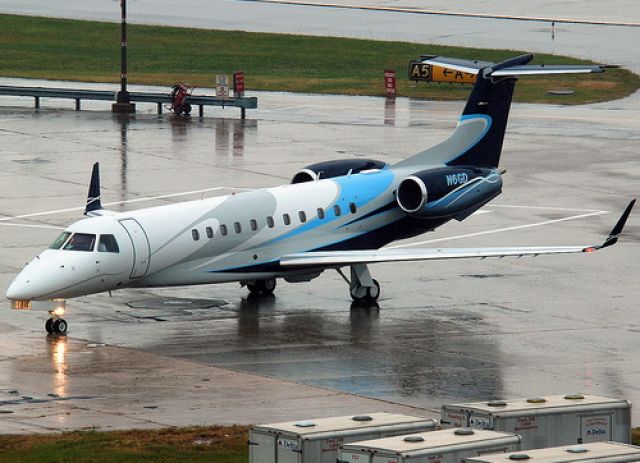 N6GD — - This was taken by another photographer & uploaded online. Its a great photo of us taxiing in to the ramp during a nice autumn downpour.