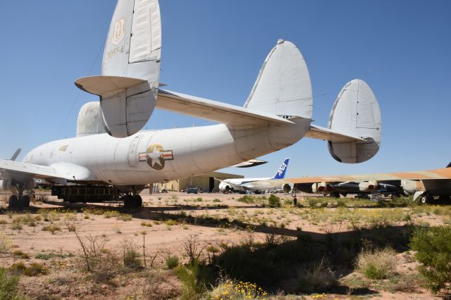 Boeing 787-8 (N787EX) - 03/27/2015 Pima Air Museum AZ, Pulling engines. Will be staying here. Boeing  Dream Liner c-121 B-52  