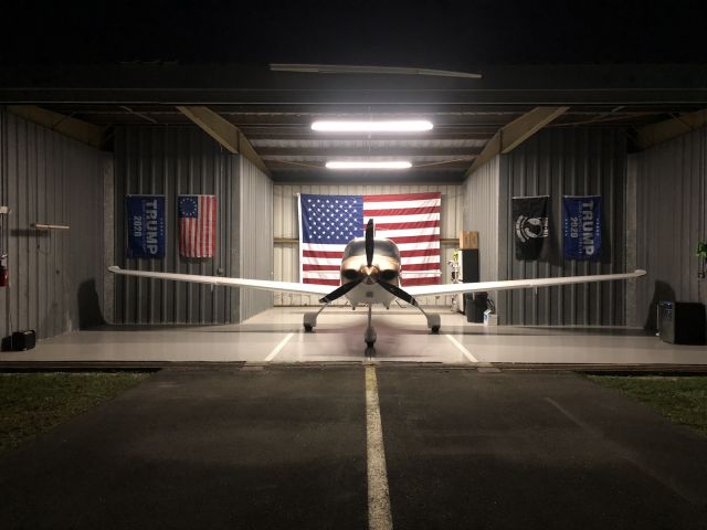 Cirrus SR-22 (N366LD) - Standing outside America’s hangar.