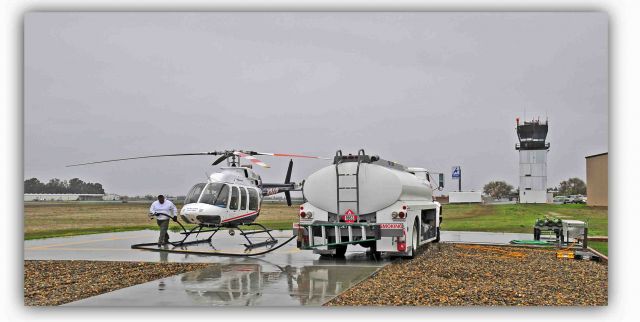 Bell 407 (N184AM) - Frank refueling the Air Methods Helicopter. Gota keep her topped-off