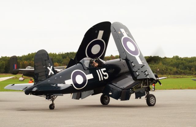 — — - GOODYEAR FG-1D CORSAIR unfolding wings