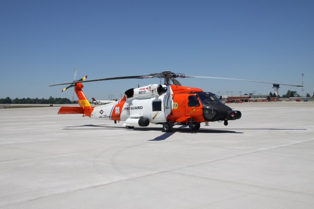 CG6017 — - U.S.C.G. Helicopter 6017 parked in front of Tac-Air at KLEX