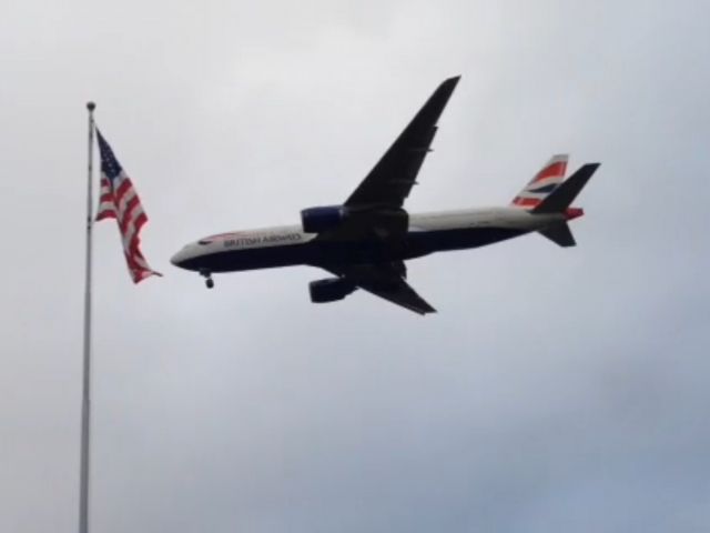 Boeing 777 — - Daily Heathrow/San Diego flight starting the steep, narrow final descent, taken at a popular plane-spotting site in Balboa Park. 