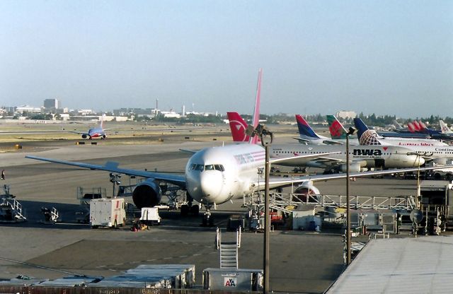 BOEING 767-200 — - KSJC - 630am morning ramp view - on the left, Kmart taxis to 30L- NWA Airbus readied for MSP.