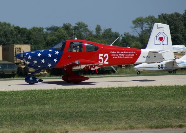 Cessna Citation Mustang (N52KS) - Nice looking RV-10 Arriving on Runway 27 at Airventure 2011