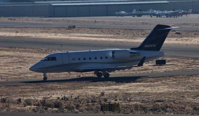 Canadair Challenger (N604FM) - Taxiing on delta 3 from 27 at Carson City