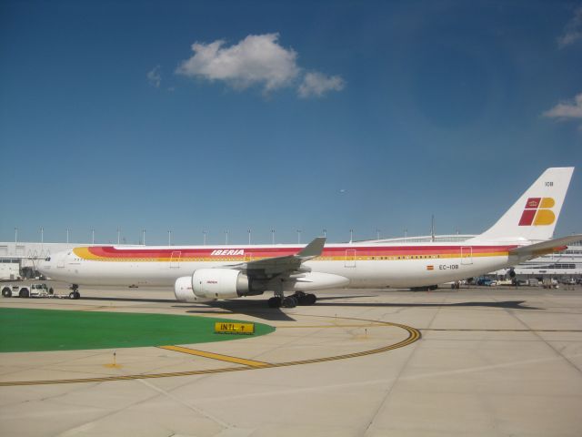 Airbus A340-600 (EC-IOB) - Iberia being towed to Intl terminal