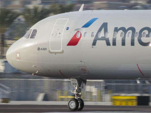 Airbus A321 (N159AN) - Taking off Runway 27 at SAN. Recently delivered when this photo was taken.