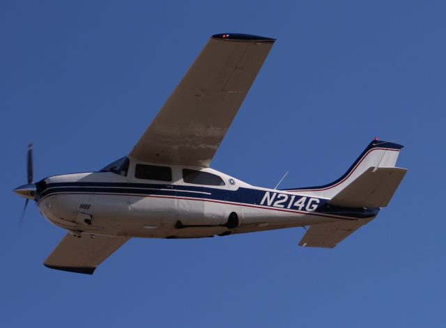 Cessna Centurion (N214G) - A Cessna 210L Centurion doing a pass down Runway 36 at Pryor Field Regional Airport, Decatur, AL - December 14, 2016.