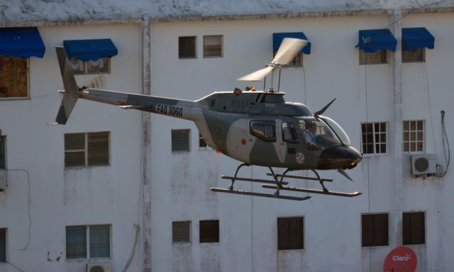 FAD3060 — - FAD-3060 (cn 44009) Bell OH-58 Kiowa from the “Escuadron de Rescate” based at San Isidro AB, Dominican Republic. Photo taken in a town called "Jaun Dolio".