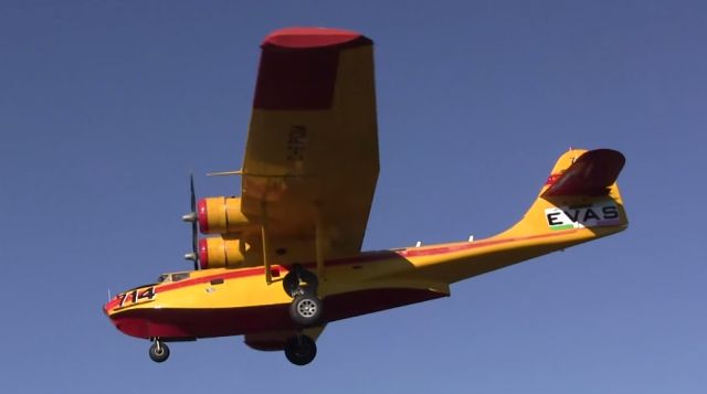 Piper Aztec (C-FPQM) - A Consolidated PBY-5A Canso operated by lands at Gander International for its first flight in a number of years.