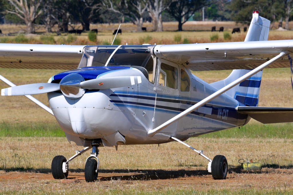 Cessna Centurion (VH-CXT) - Beautiful clean paint on this 1960 Cessna C210.