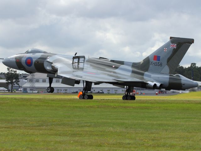 — — - Safely back down, the Avro Vulcan B-2 deploy's air brakes to slow down after performing a flying display at FIA 2012.