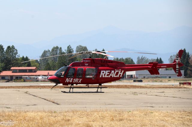 Bell 407 (N41RX) - KRDD - REACH medevac at the Redding helicopter pad on the east side of the runway, click full