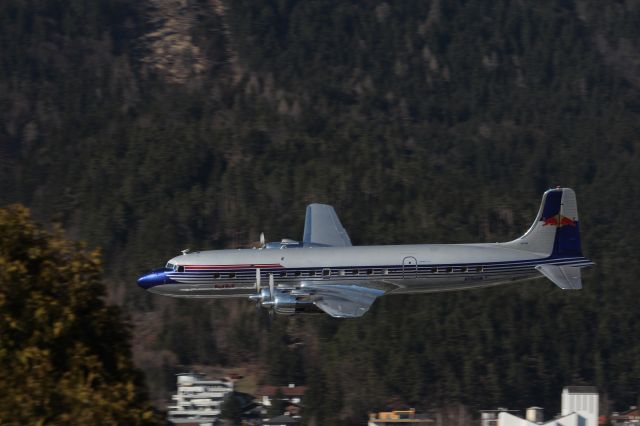 Douglas DC-6 (N996DM) - A NICE OVERSHOUT AT LOWI