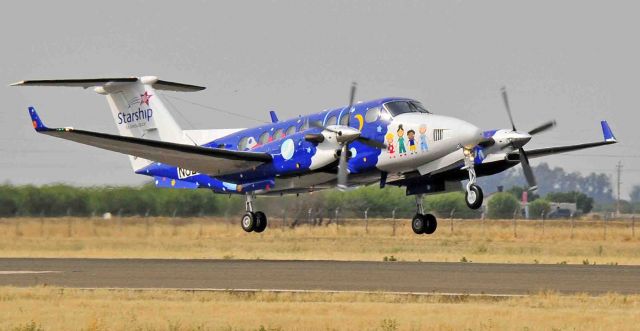 Beechcraft Super King Air 300 (N823CF) - Super King Air departing the Merced Regional Airport (KMCE) heading West...