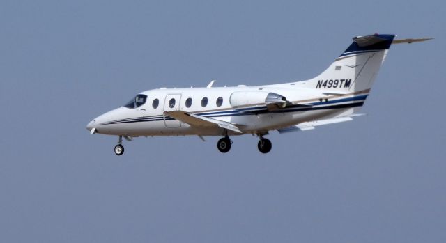 Beechcraft Beechjet (N499TM) - On final is this 2010 Hawker-Beechcraft Beechjet 400A in the Winter of 2019.