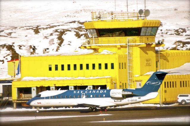 Canadair Regional Jet CRJ-200 (C-GFIO) - It was a beautiful day in Iqaluit, Nunavut. Plane Just came in from Deer Lake, Newfoundland