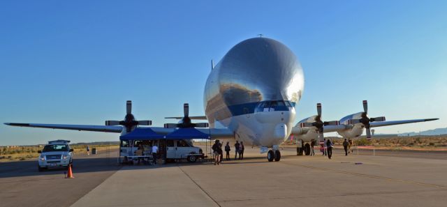 — — - Amigo Airsho 2011 in El Paso TX. NASAs Super Guppy sitting on the tarmac. I literally drive by it every day on the way to work as it is parked next to NASAs El Paso hangar. It is indeed very impressive to see and to compare regular sized aircraft such as the T-38 that NASA is using to train their astronauts. Under the right wing you can see a Chevy cargo van.