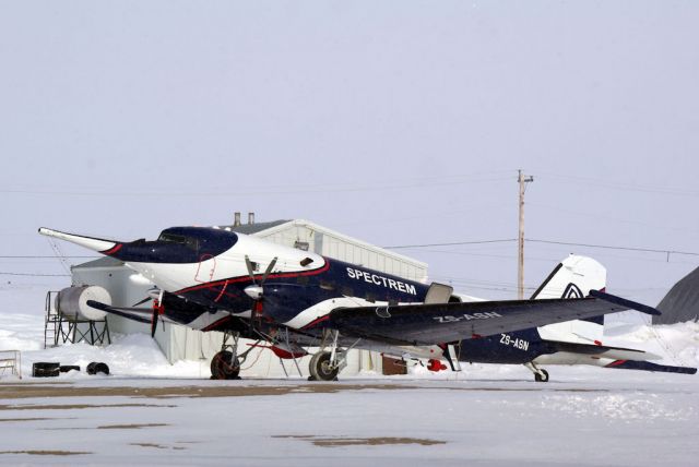 Douglas DC-3 (turbine) (ZS-ASN) - I spotted this plane in Coral Harbour, Nunavut, Canada on 2009-05-18 at 2:51 PM Just found this in my Archives. Company is SPECTREM AIR LTD from South Africa. A great plane to see so far north. 