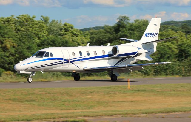 Cessna Citation Excel/XLS (N590AK) - N590AKs new paint scheme! Just after touchdown on runway 2.