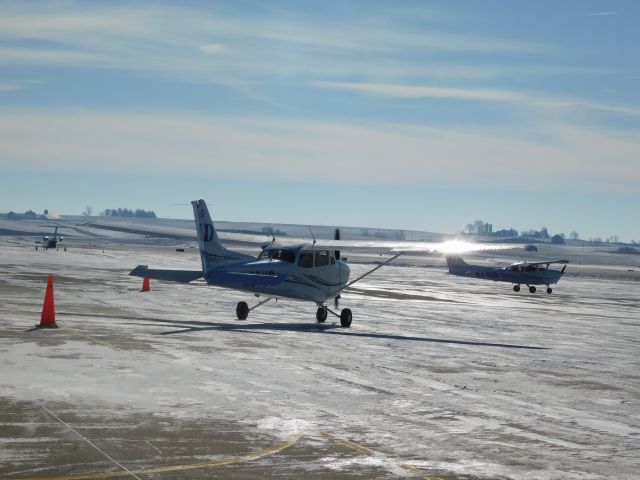 Cessna Skyhawk (N57UD) - A clear January day meant a busy day of flying for University of Dubuque Aviation Students.  In this case, a near empty ramp was a good thing!!!