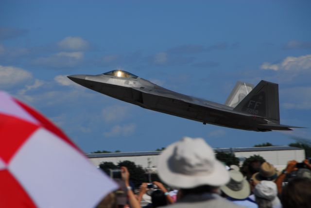 Lockheed F-22 Raptor — - Raptor departing for Demo Flight at EAA OSH AIR VENTURE