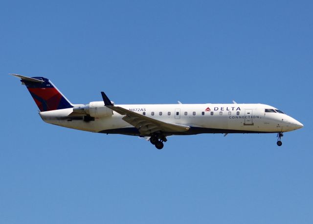 Canadair Regional Jet CRJ-200 (N872AS) - At Shreveport Regional.