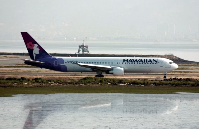 BOEING 767-300 (N588HA) - KSFO - Apr 5th 2005 - Hawaiian Boeing 767-300 series on idle to the 28LR departure runways for Honolulu.