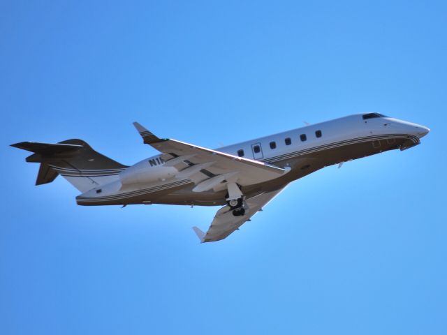 Bombardier Challenger 300 (N1RH) - HENDRICK MOTORSPORTS LLC departing runway 20 at KJQF - 2/27/13